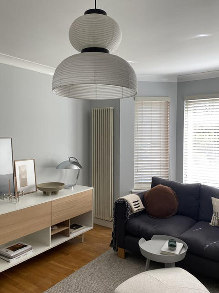 Scandi style living room with a light oak console table, in a room painted in Lick Grey 01 paint
