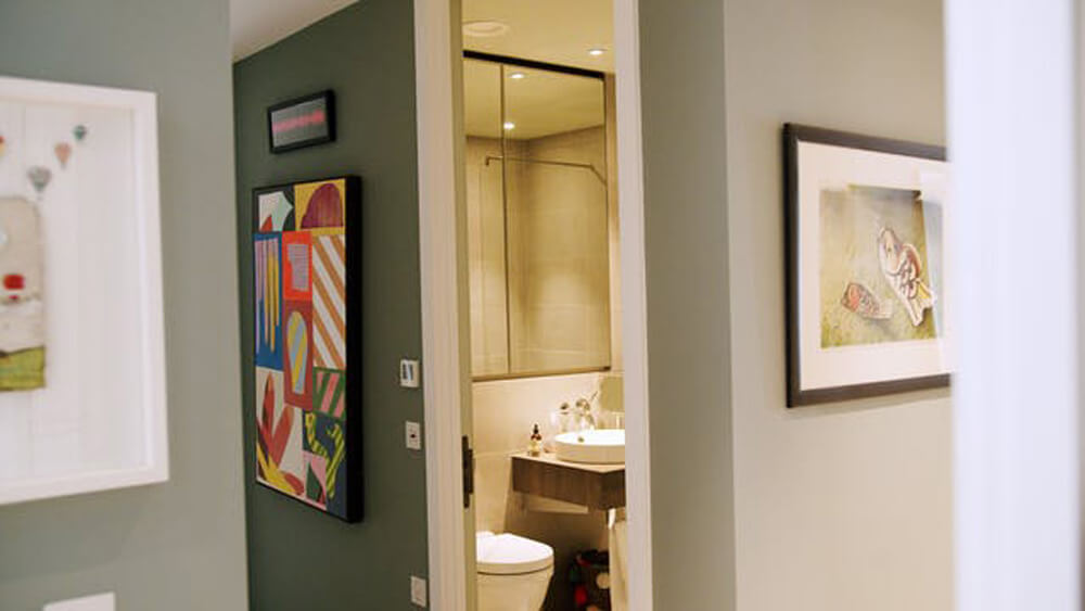 Vogue Williams' hallway painted in Lick Teal 02 paint