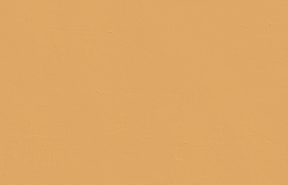 Textured wall decorated in Lick Yellow 02 paint shade