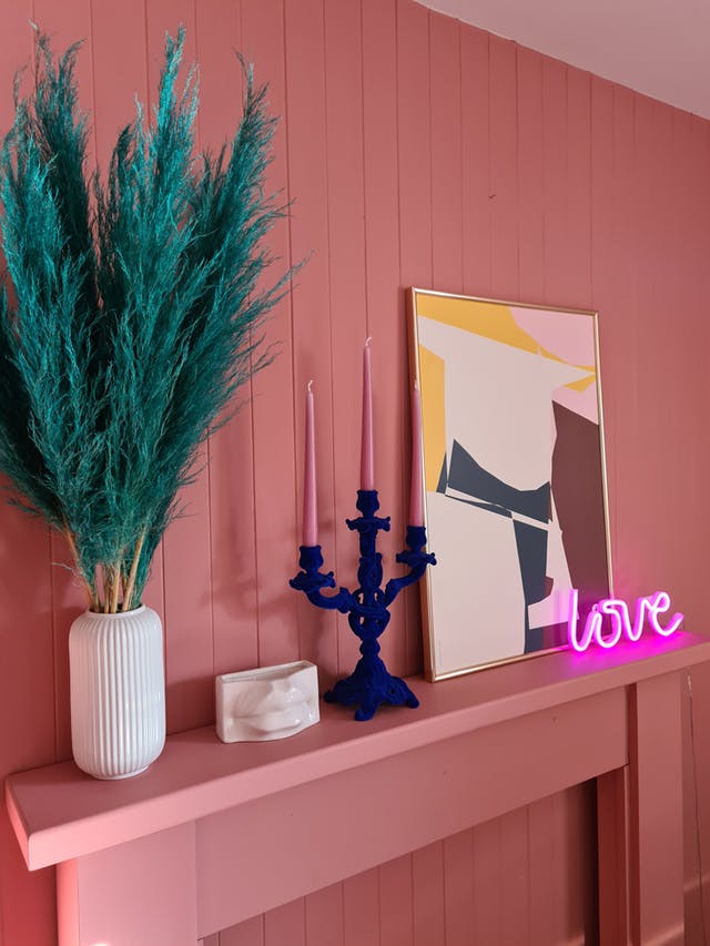 Fireplace surround and walls painted in Lick paint Red 03