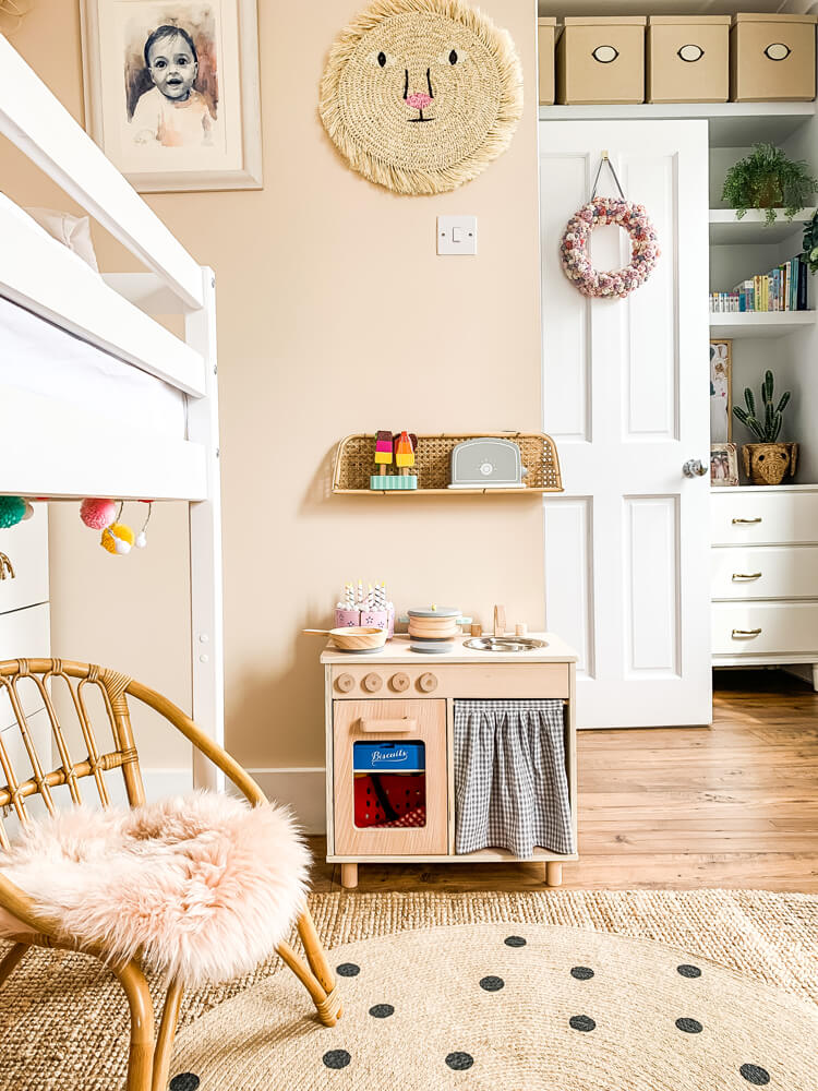Neutral nursery painted in Lick Pink 02