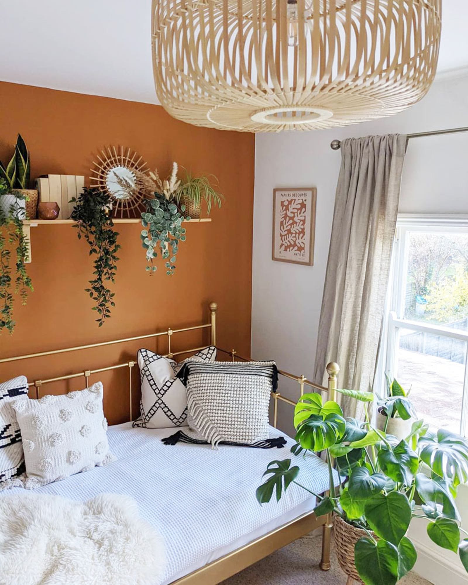 An image of a bedroom painted in Lick Orange 02