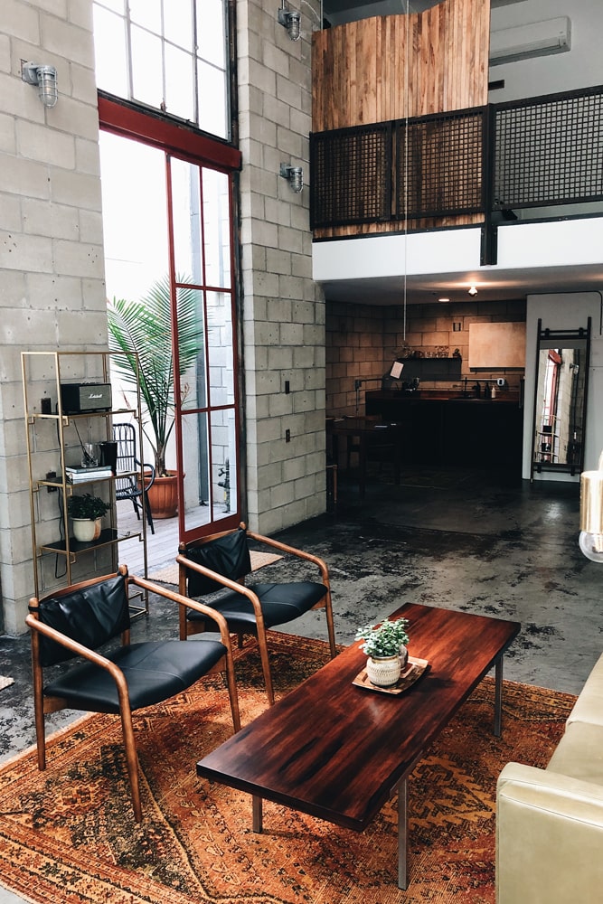 Industrial living room with concrete floor