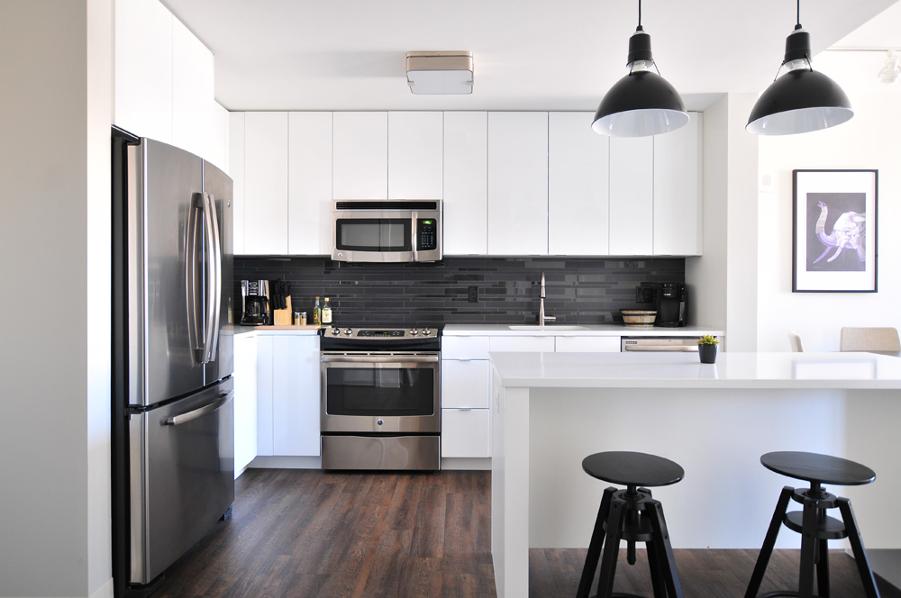 Monochrome modern kitchen with smart storage