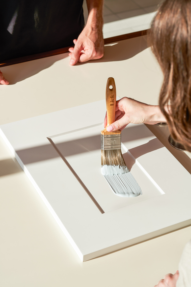 Woman testing paint in Lick's Northcote 65 store