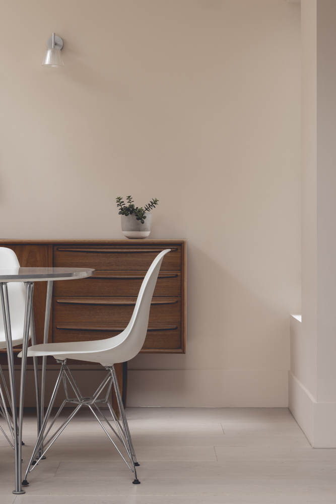 Minimalist dining room painted in Lick Pink 02 paint