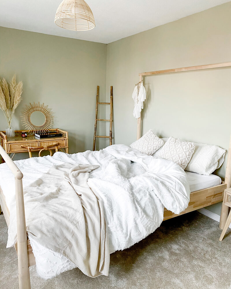 Boho bedroom painted in Lick Greige 01 paint