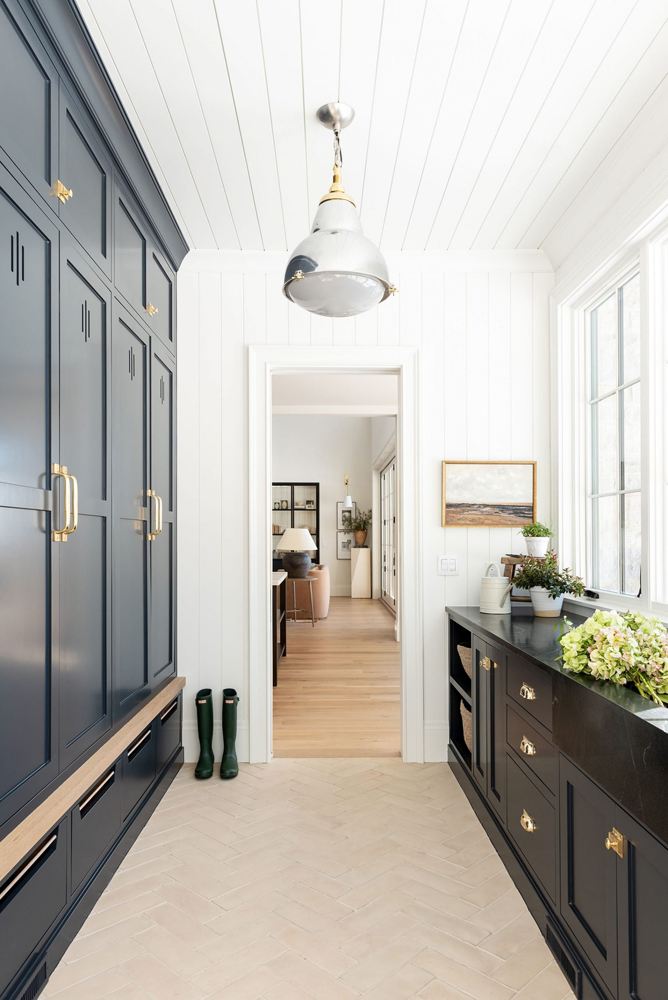 Modern farmhouse kitchen with black painted cabinets by studio Mcgee