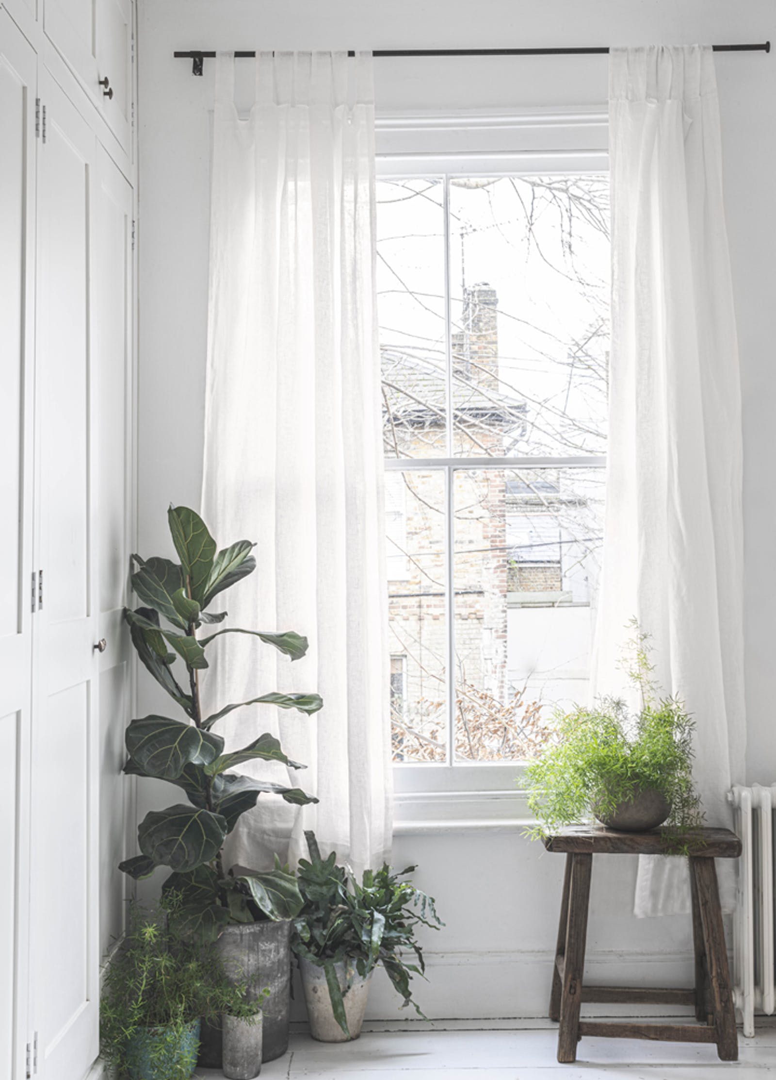 Linen curtains with plants 