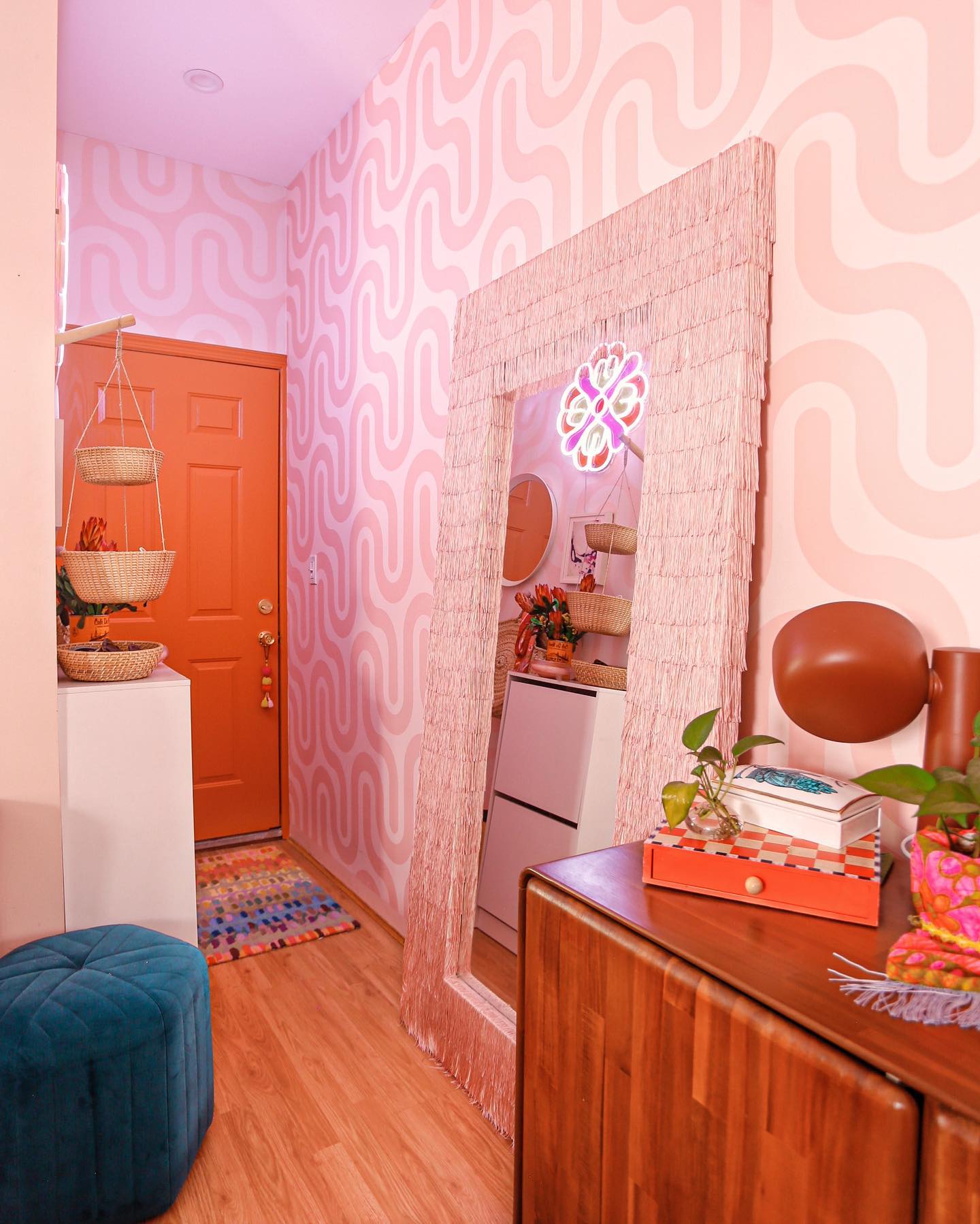 Hallway decorated in Lick Orange 04 paint on the door