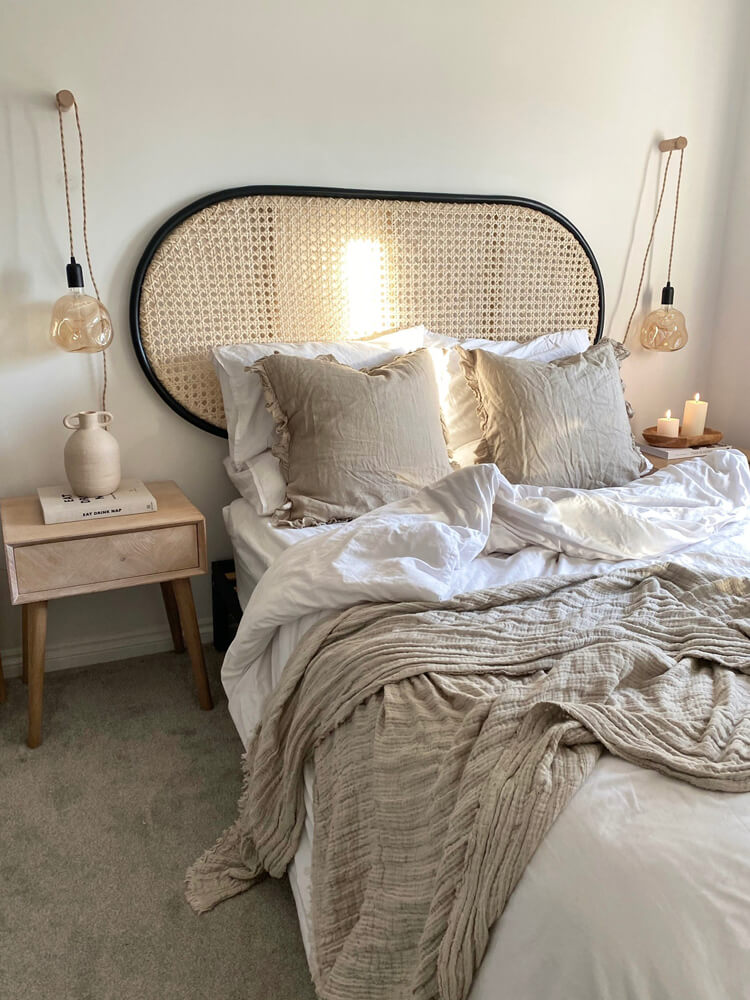 Neutral bedroom with rattan headboard