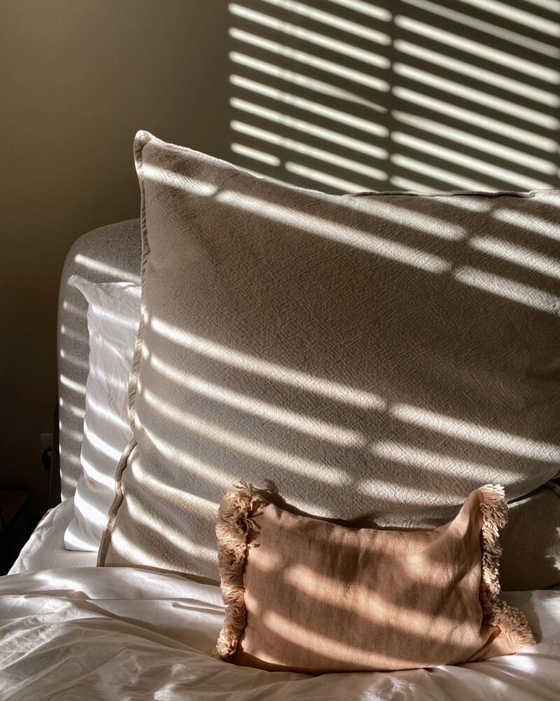 Cosy bedroom painted in Lick Beige 03 paint