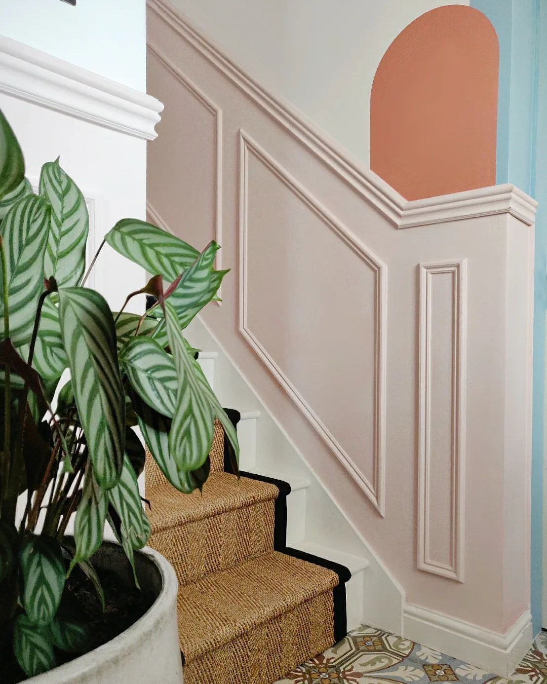 Hallway decorated in Lick White 01 and Pink 04 paint