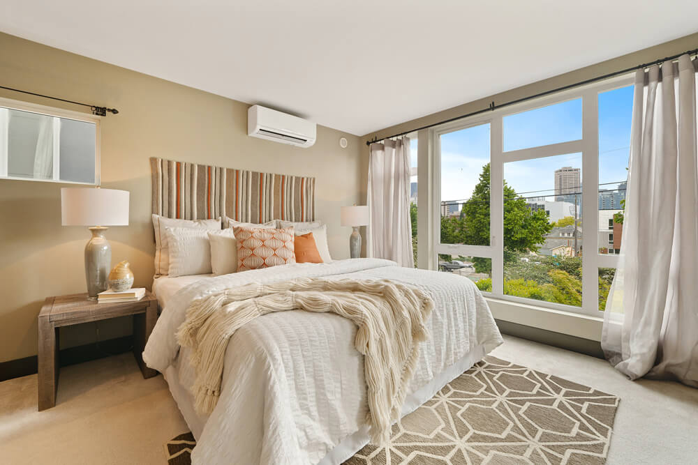 Wall hanging fabric as a headboard in a bedroom