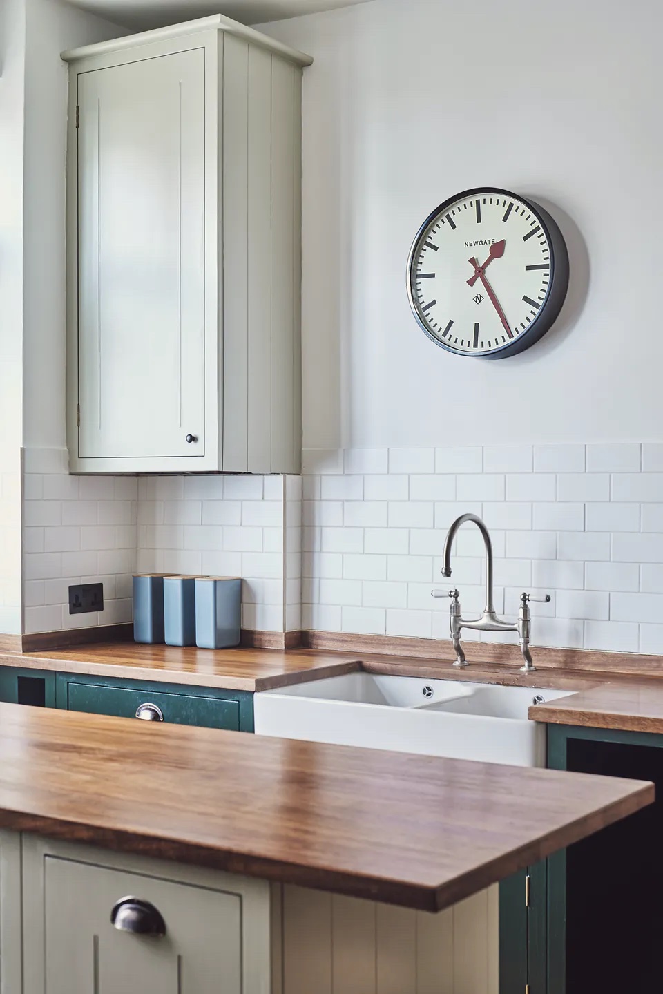 Traditional kitchen painted in Lick Green 06 paint and Greige 02 paint via Topology Interiors