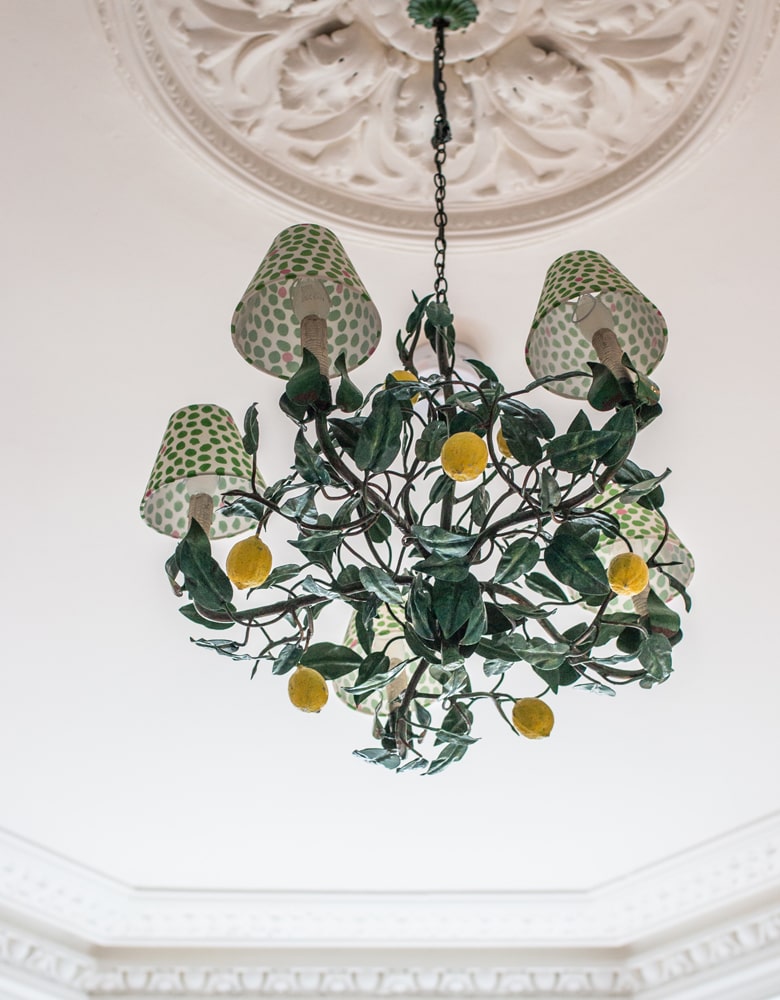Traditional ceiling roses with green chandelier