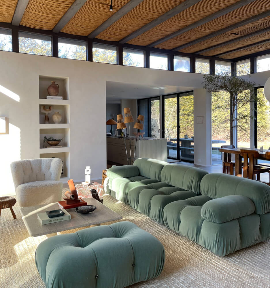 Forrest green sofa in a contemporary styled living room