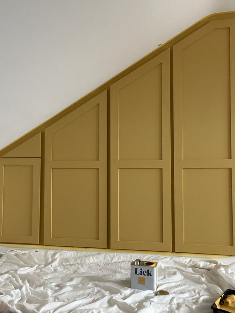 Yellow wood wall panelling 