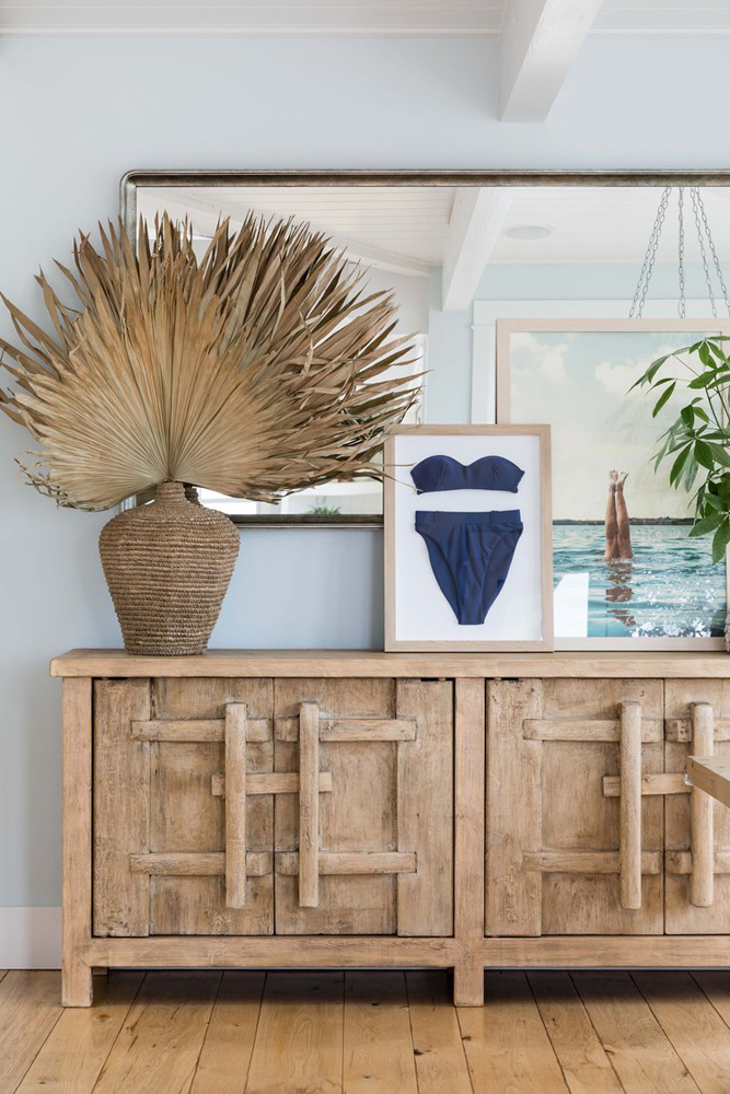 Coastal decor dining room with rustic console