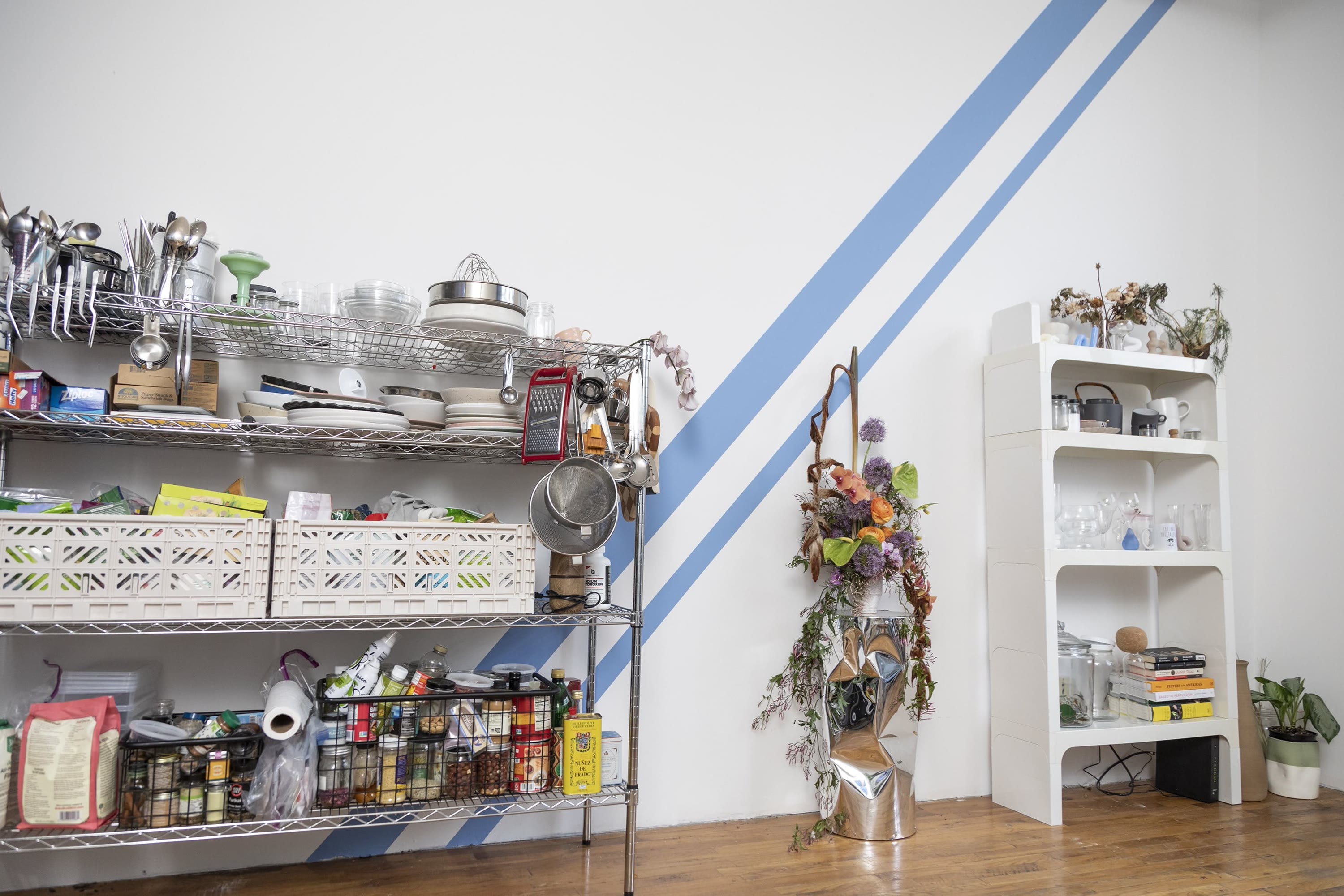 Open shelving in kitchen with Lick Blue 10 painted stripe on wall