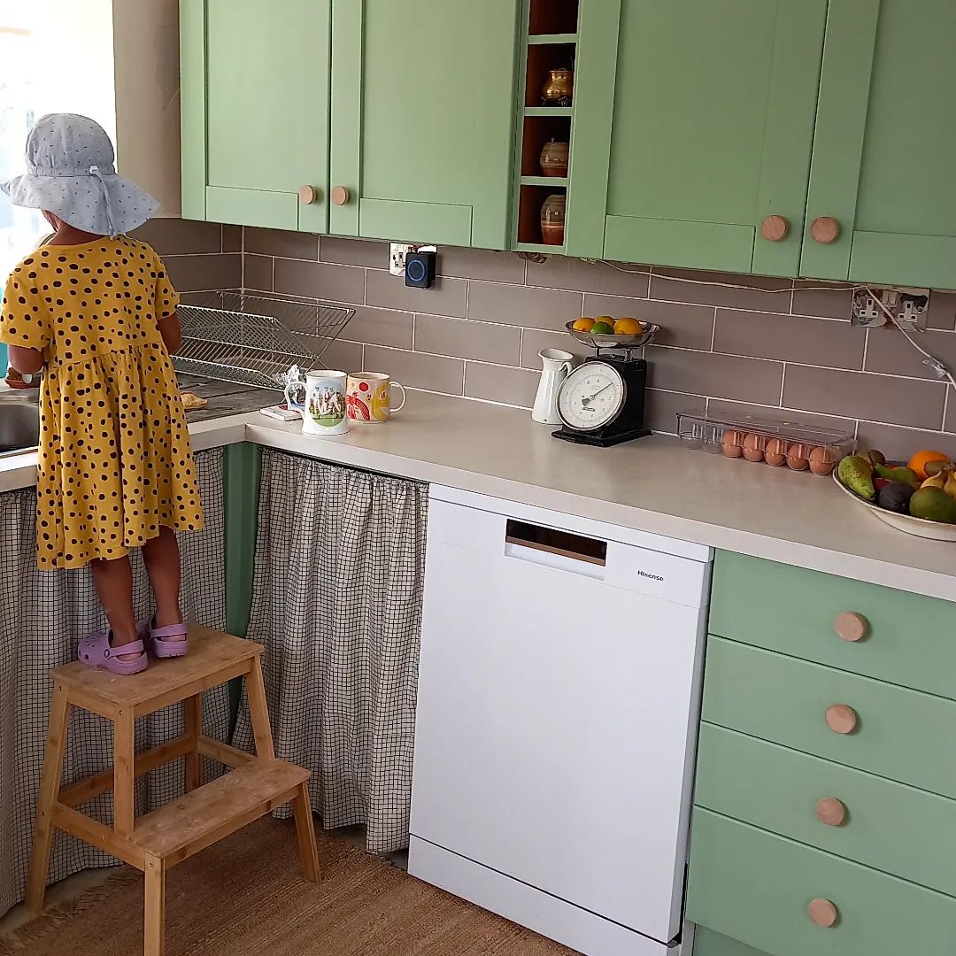 Kitchen cupboards painted in Lick Green 14 paint