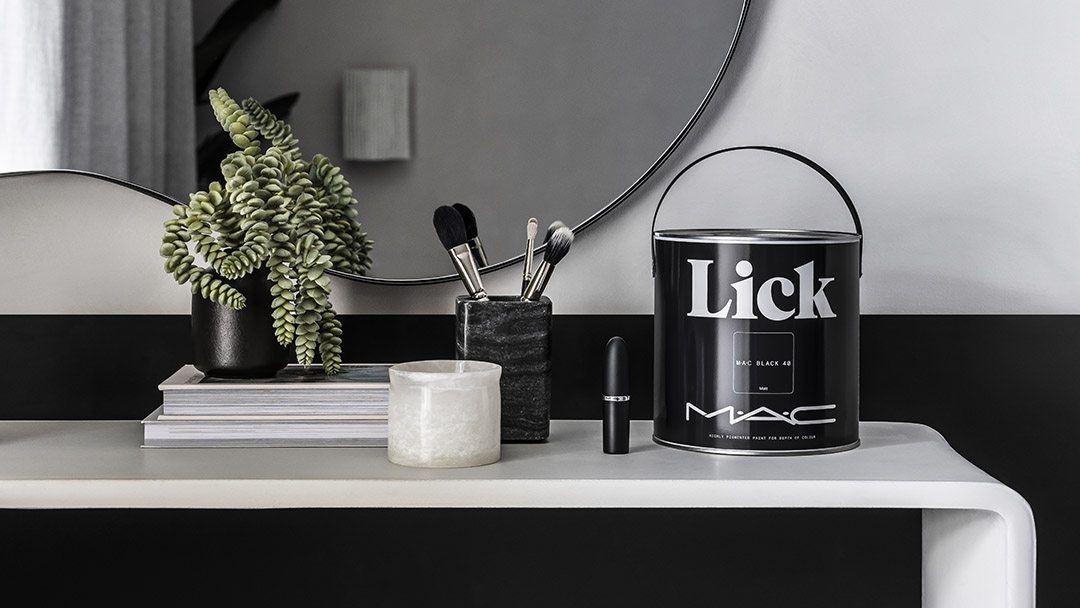 Dressing table featuring Lick x M·A·C Black 40 Paint and Lipstick in Caviar