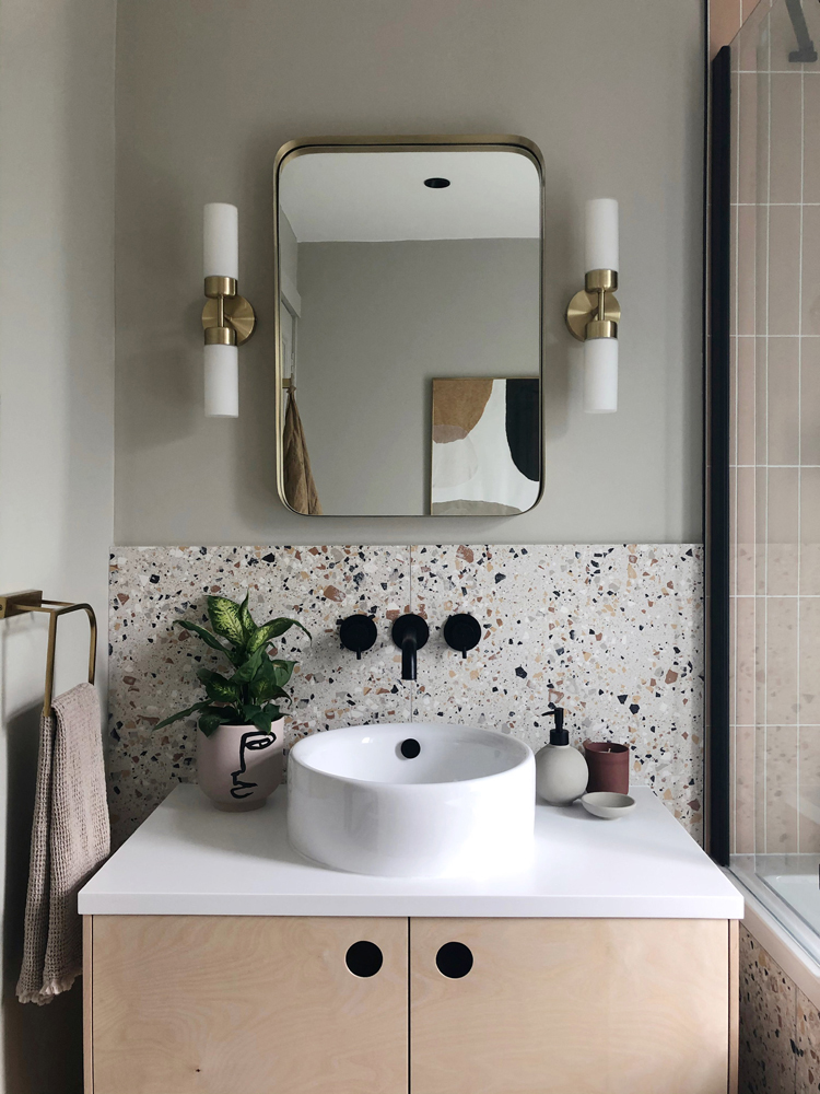 Neutral bathroom with textured stone and walls painted in Lick Greige 01 by @FORMANDBALANCE 