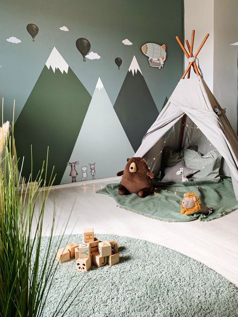 Kids bedroom DIY monochrome green mountains with teepee tent