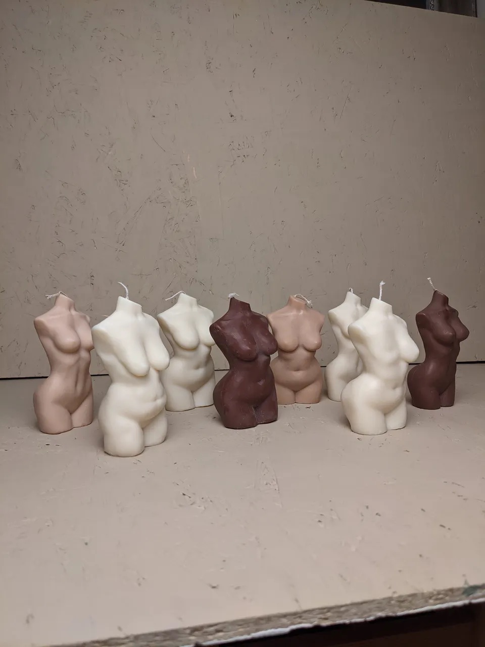 Image of candles in the shape of a woman's body made by the brand Hinansho 