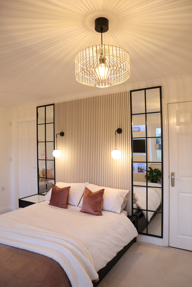 Wall panelling headboard in bedroom painted in Lick Pink 04 paint
