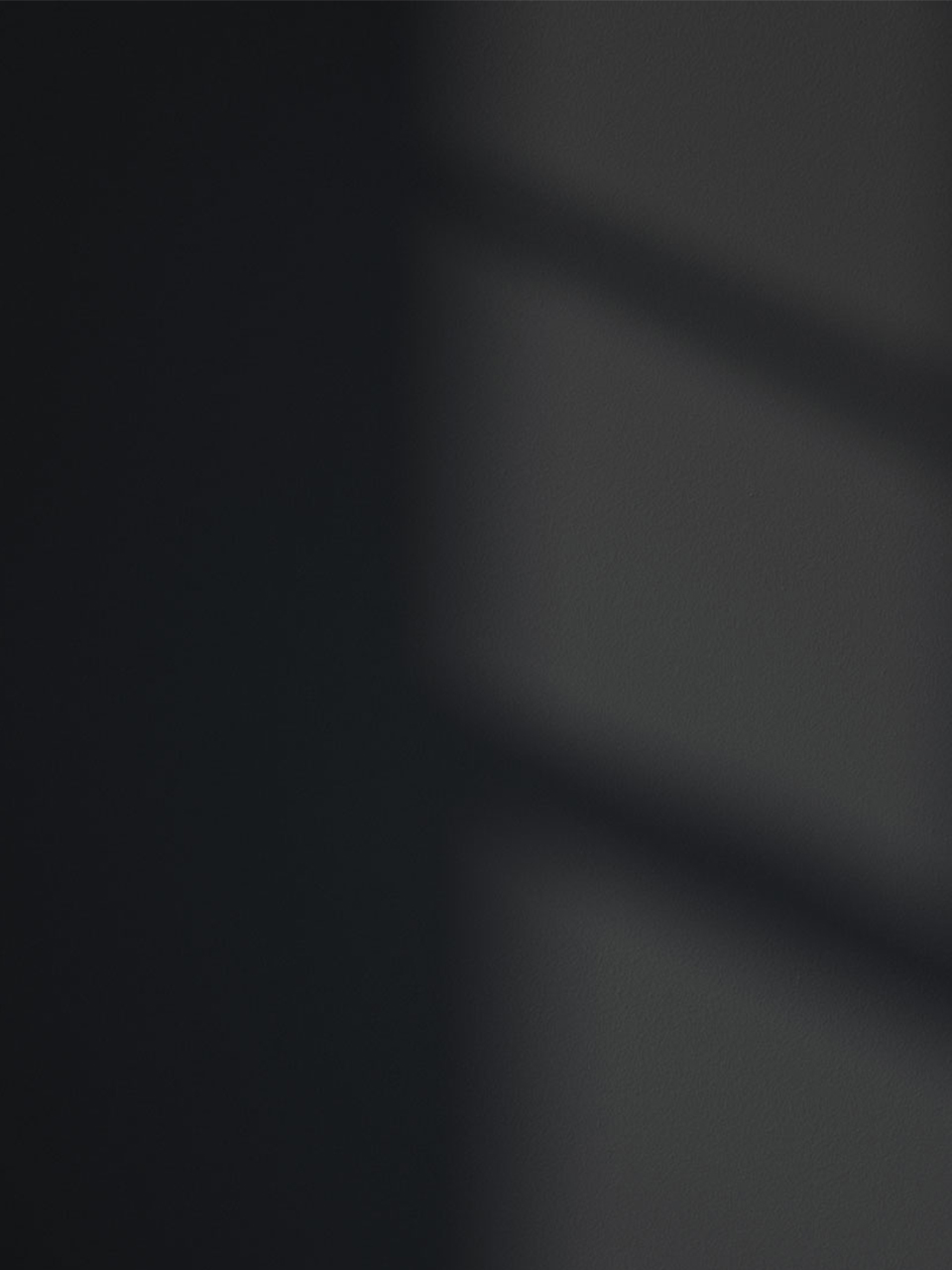 Black 02 paint shade on the wall with shadow