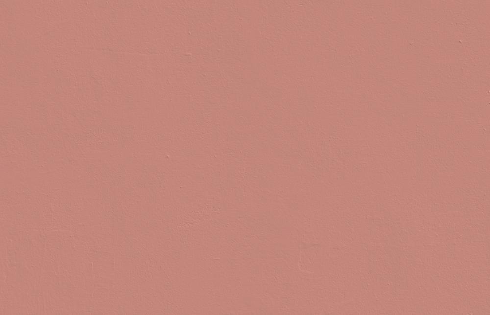 Textured wall decorated in Lick Red 03 paint shade