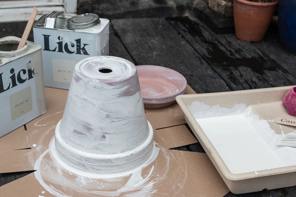 Distressed terracotta pot painted in Lick White 02