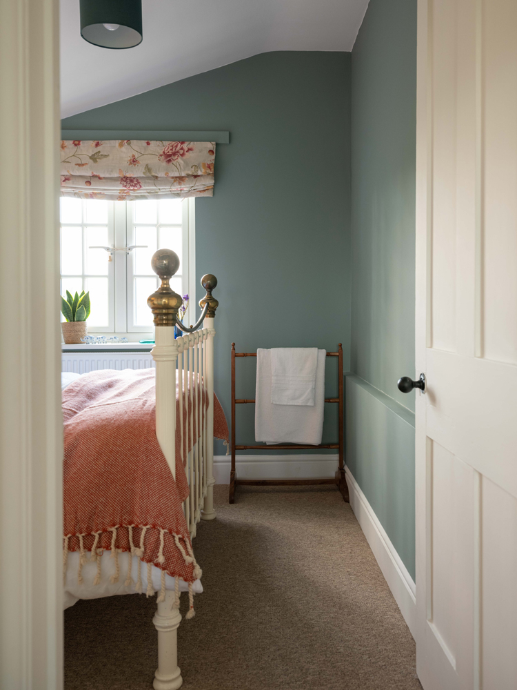 Bedroom painted in Lick Teal 01 paint