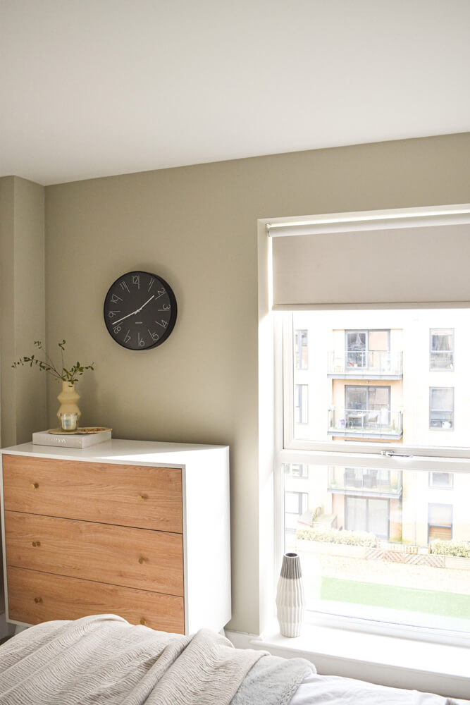Natural bedroom painted in Lick Greige 02