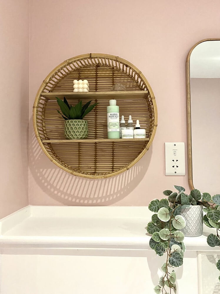Bathroom painted in Pink 03, with green plants