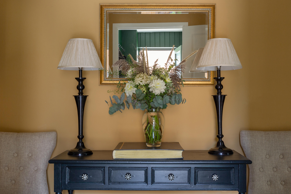 Traditional style living room decorated in Lick Yellow 02 paint