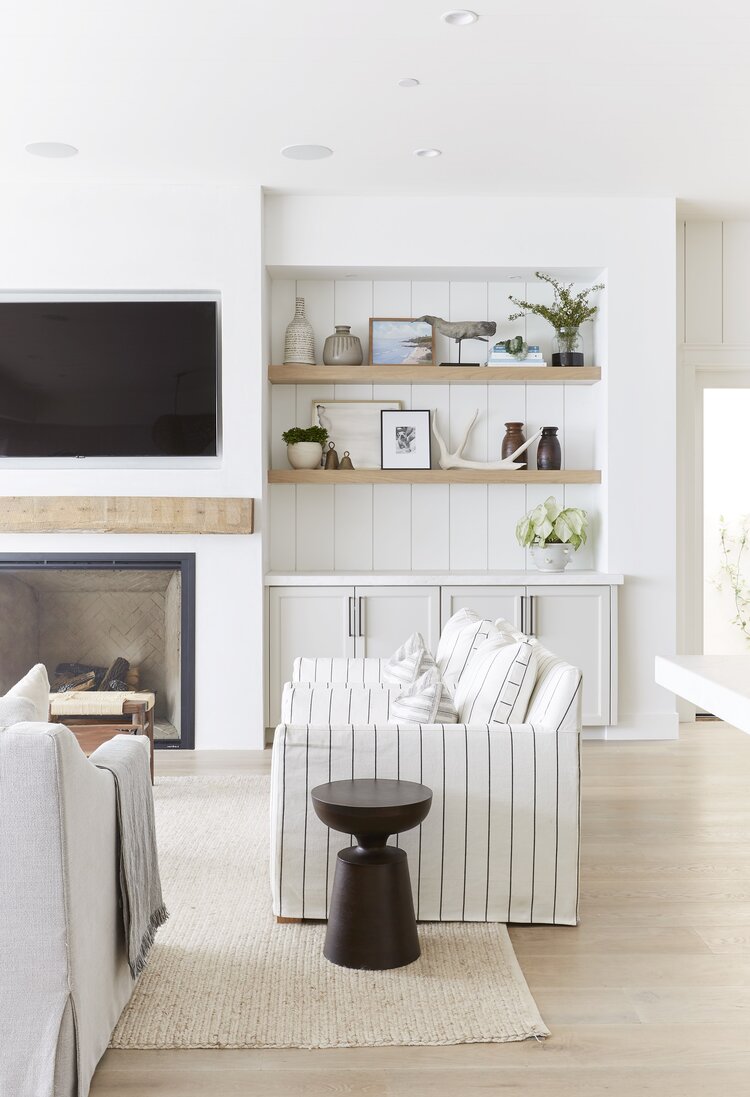 Coastal living room with white shiplap cladding