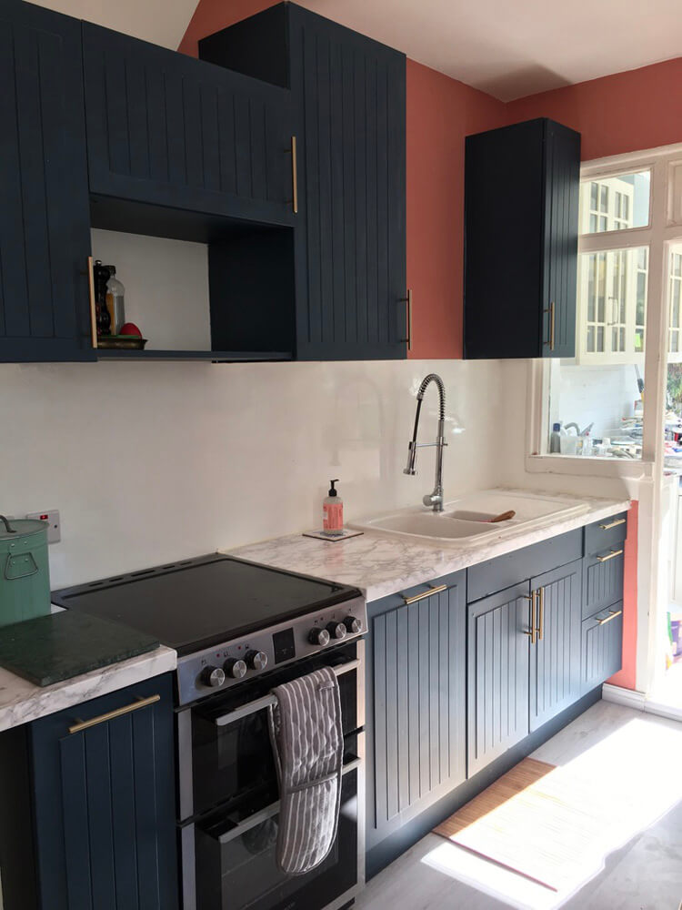 Kitchen painted in Lick Blue 07 and Red 03 paint