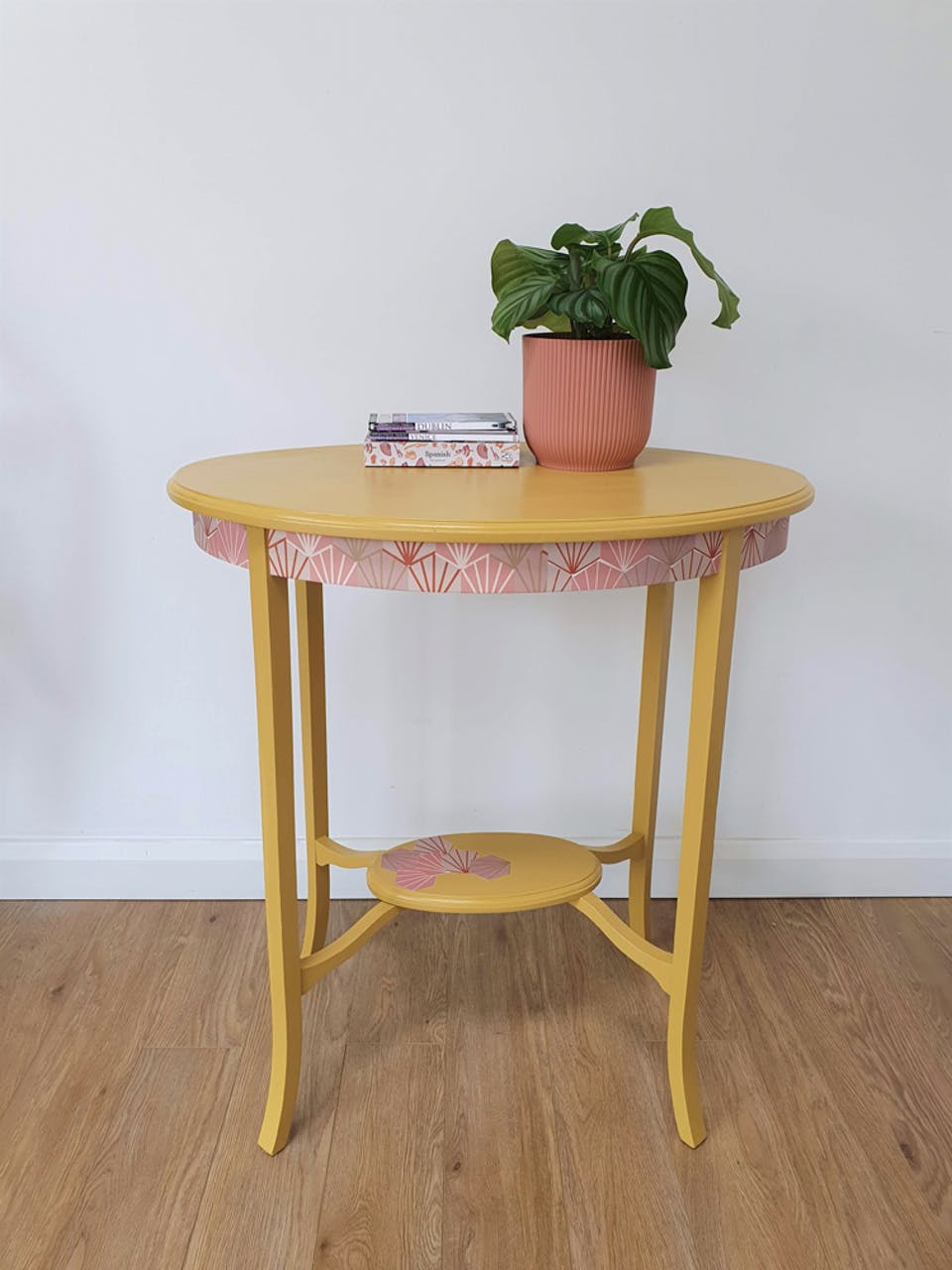 Side table upcycled by painting in Lick paint Yellow 02 and using wallpaper remnants
