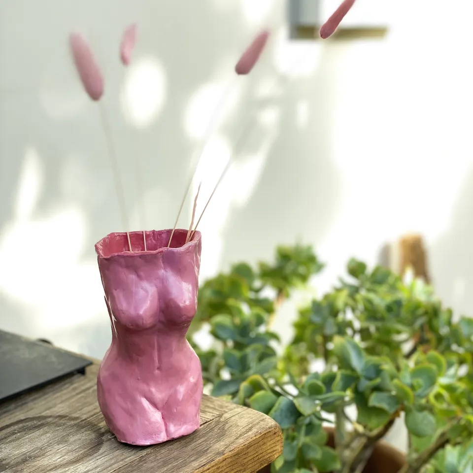 Image of a pink clay vase made from a Clay Club pottery kit