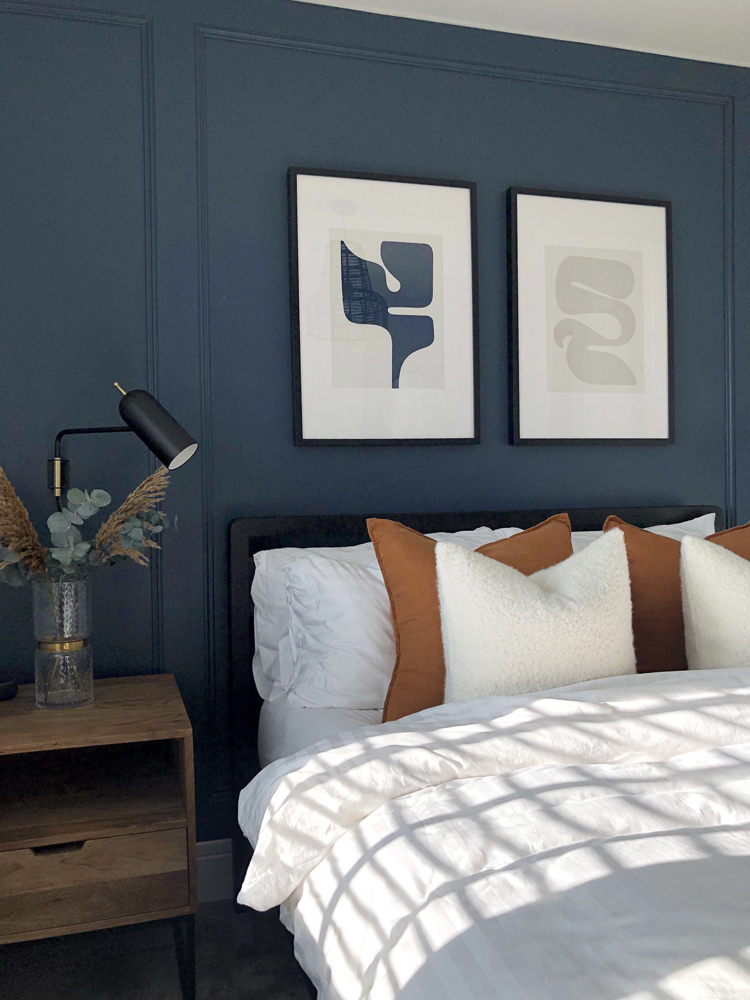 Bedroom painted in Lick Blue 07 paint with diy wall panelling