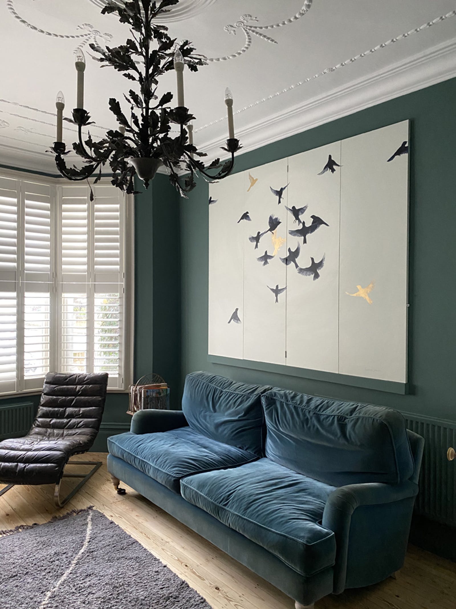 Living room painted with Lick paint Green 04 with white ceilings with decorative detailing