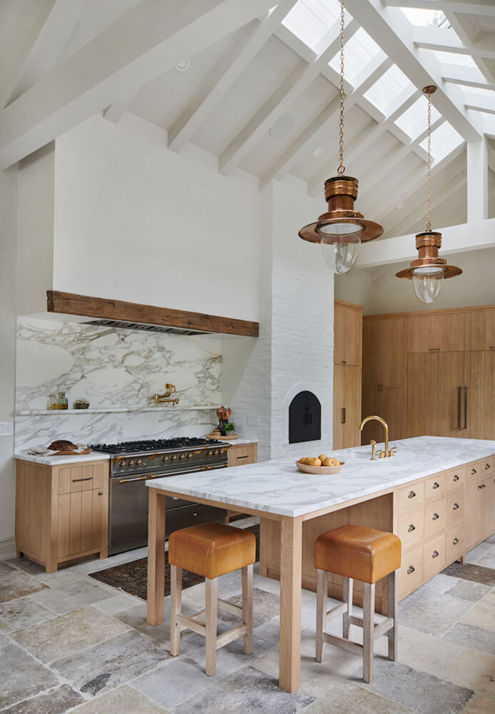 Modern farmhouse kitchen with industrial accents via Amber Interiors